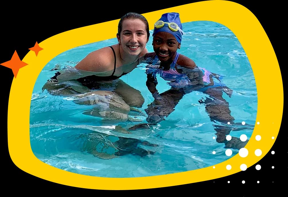 Baby enjoying a swim lesson