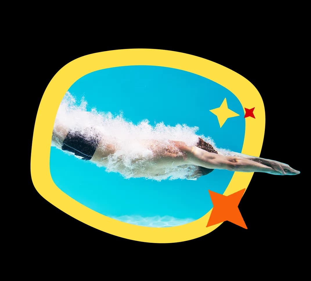 Teen diving into a pool during a swim lesson