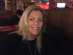 Instructor Laura M. profile Card Image