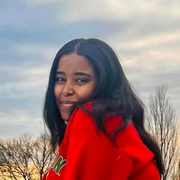 Instructor Zayna C. profile Card Image